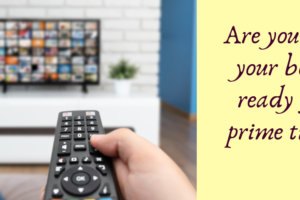 An image from the point of view of a person on the couch, pointing the remote control at a TV with many available options for watching. Text on the image says "Are you and your book ready for prime time?"