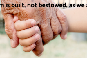 A close-up of an elderly person's hand holding a child's hand. Text over the image is a quote from Tom Collins that reads "Wisdom is built, not bestowed, as we age." The image is connected to an article on how to grow wiser as you age.
