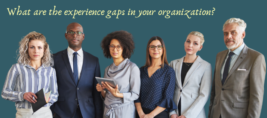 A multigenerational, multiracial, mixed-gender group of businesspeople against a dark teal background. Text at the top of the image reads, "What are the experience gaps in your organization?" The image is attached to a posts on the benefits of elderships, deliberately retaining older workers so that younger workers can learn from their experience and benefit from their perspective.