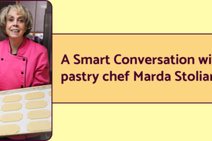 Pastry chef Marda Stoliar holds a baking sheet with unbaked cookies. Text next to the image reads, "A smart conversation with pastry chef Marda Stoliar."